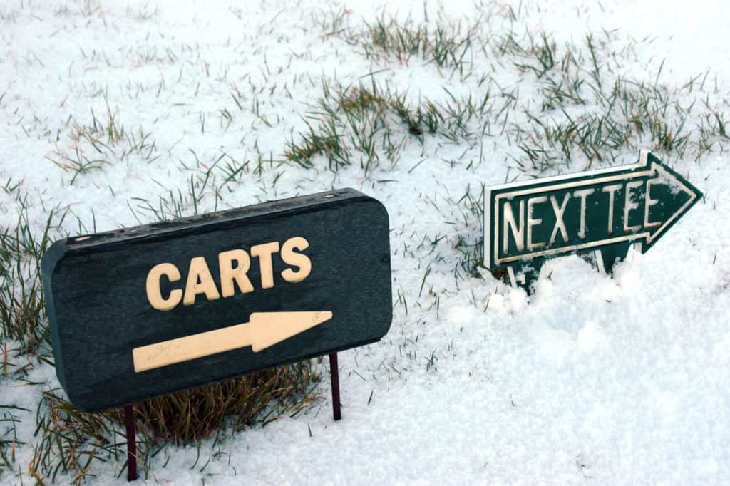 golf cart sign in winter on golf course