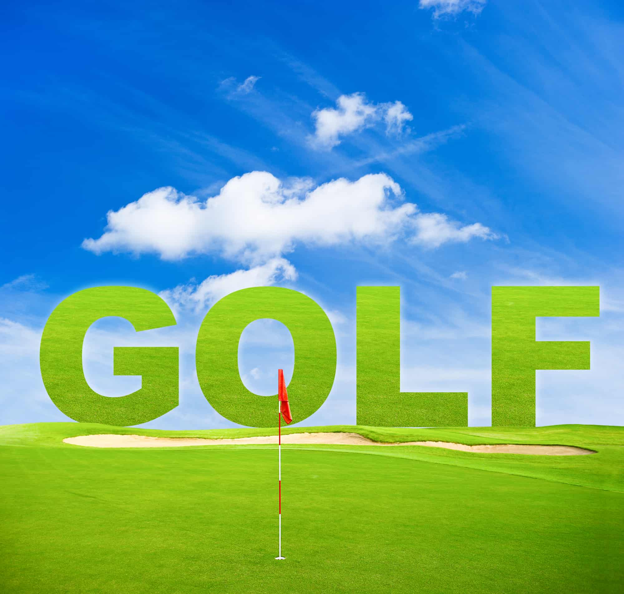 green golf field with red flag and blue sky background