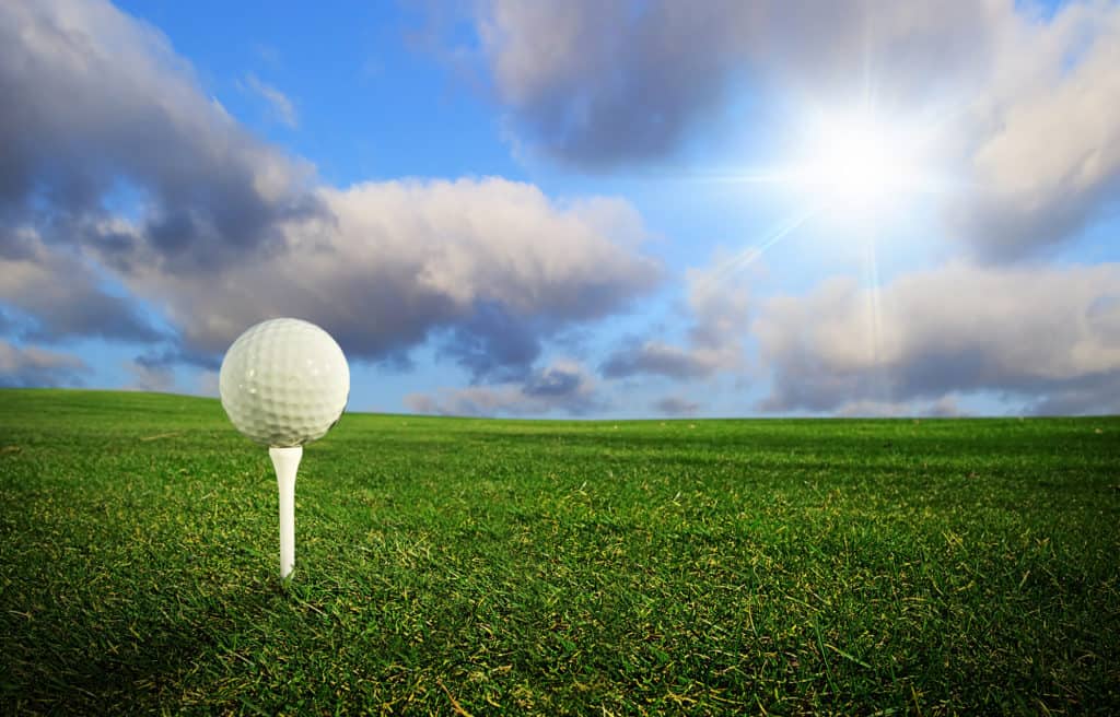 golf ball sitting on a tee