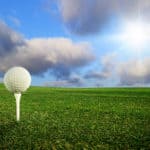 golf ball sitting on a tee