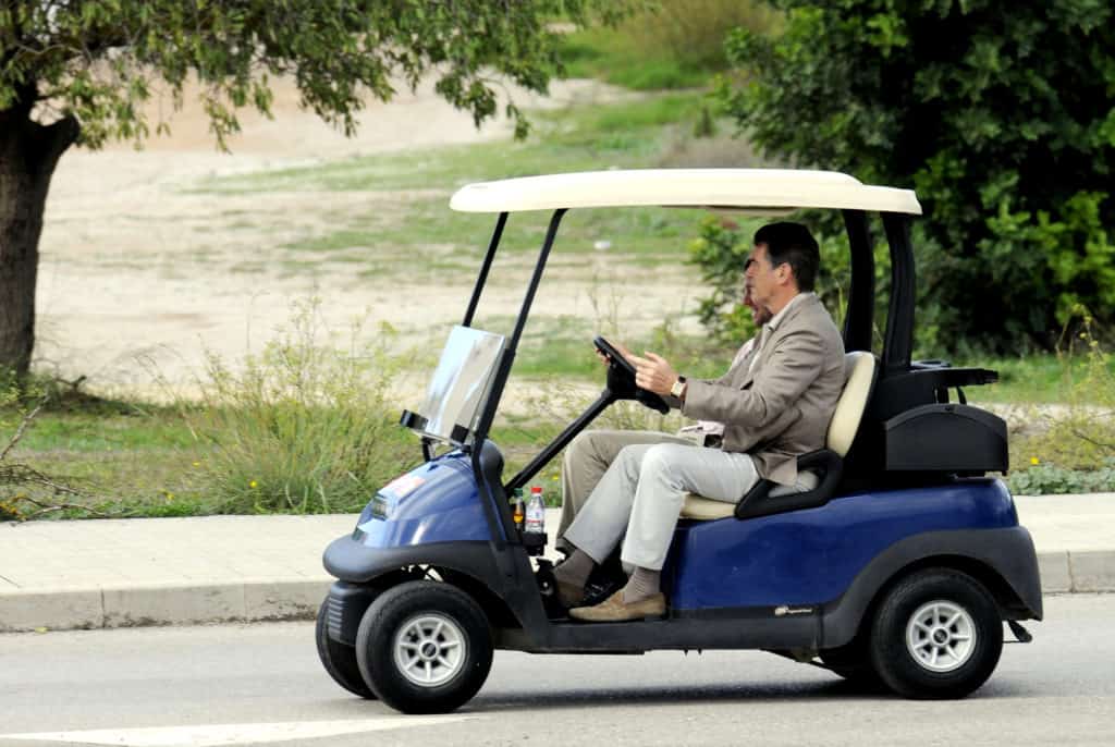 people riding show speed sensor in golf cart