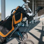 golf clubs sitting in golf bag