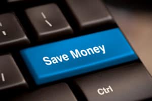 save money for investment concept with a blue button on computer keyboard