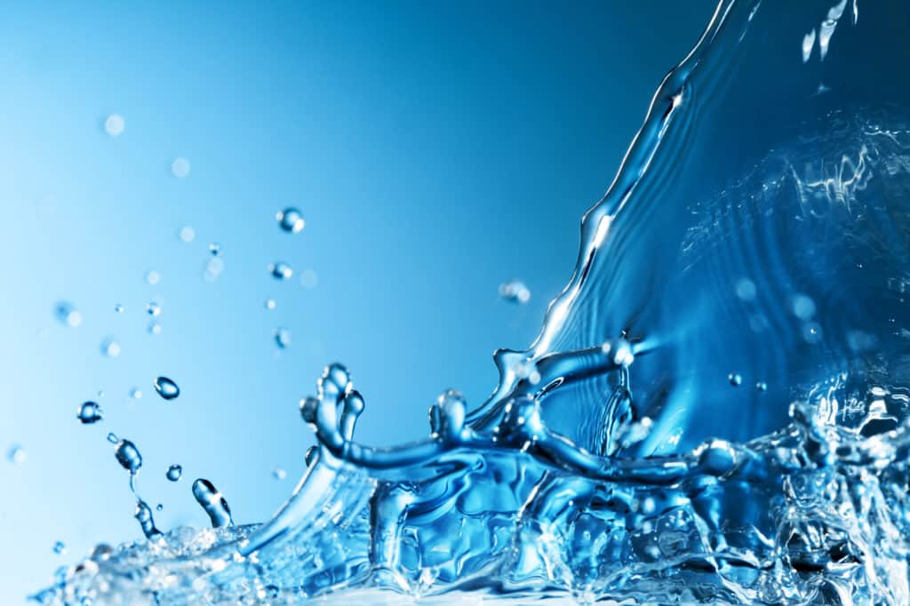 Abstract Splash of Water on a Blue Background