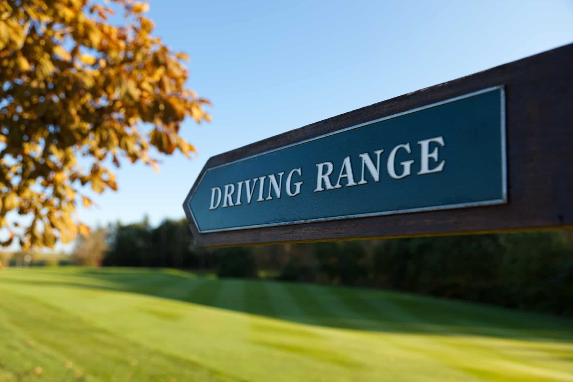 Driving Range direction sign at a golf course