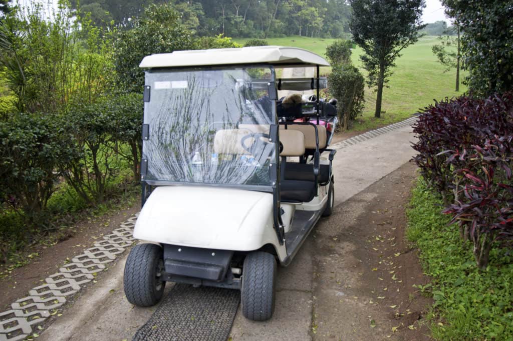 Tropical Golf Cart parking on road