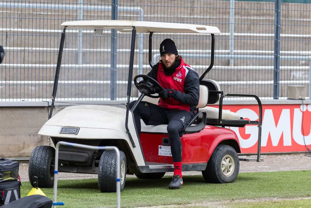 man on ezgo golf cart