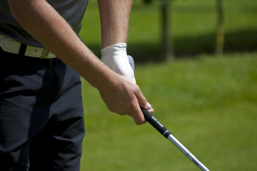 SAINT-OMER, FRANCE. 16-06-2010, A golfer grips a club during the preview day of the European Tour, 14th Open de Saint-Omer, part of the Race to Dubai tournament and played at the AA Saint-Omer Golf Club 