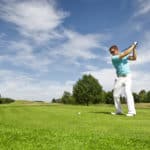 An image of a young male golf player