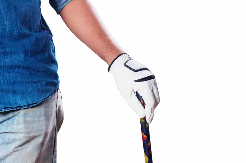 hand of male with golf on a white background.