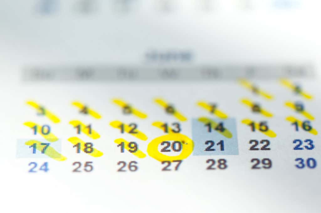 Closeup of dates on calendar page