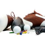 Golf shoes and equipment isolated on white