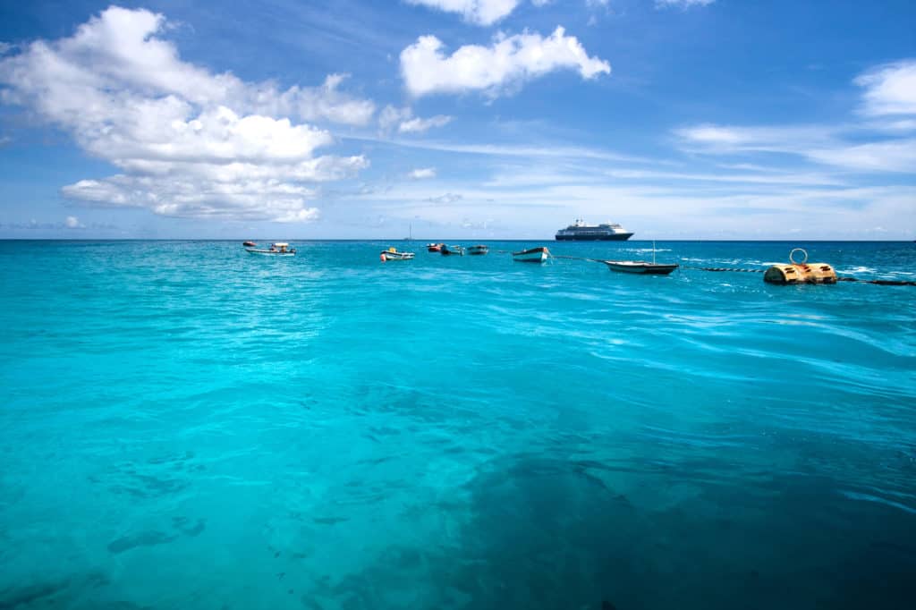 Cruise ship anchored in tropical waters of Clarence Bay, Ascension Island