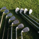 golf clubs on grass