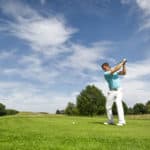 An image of a young male golf player