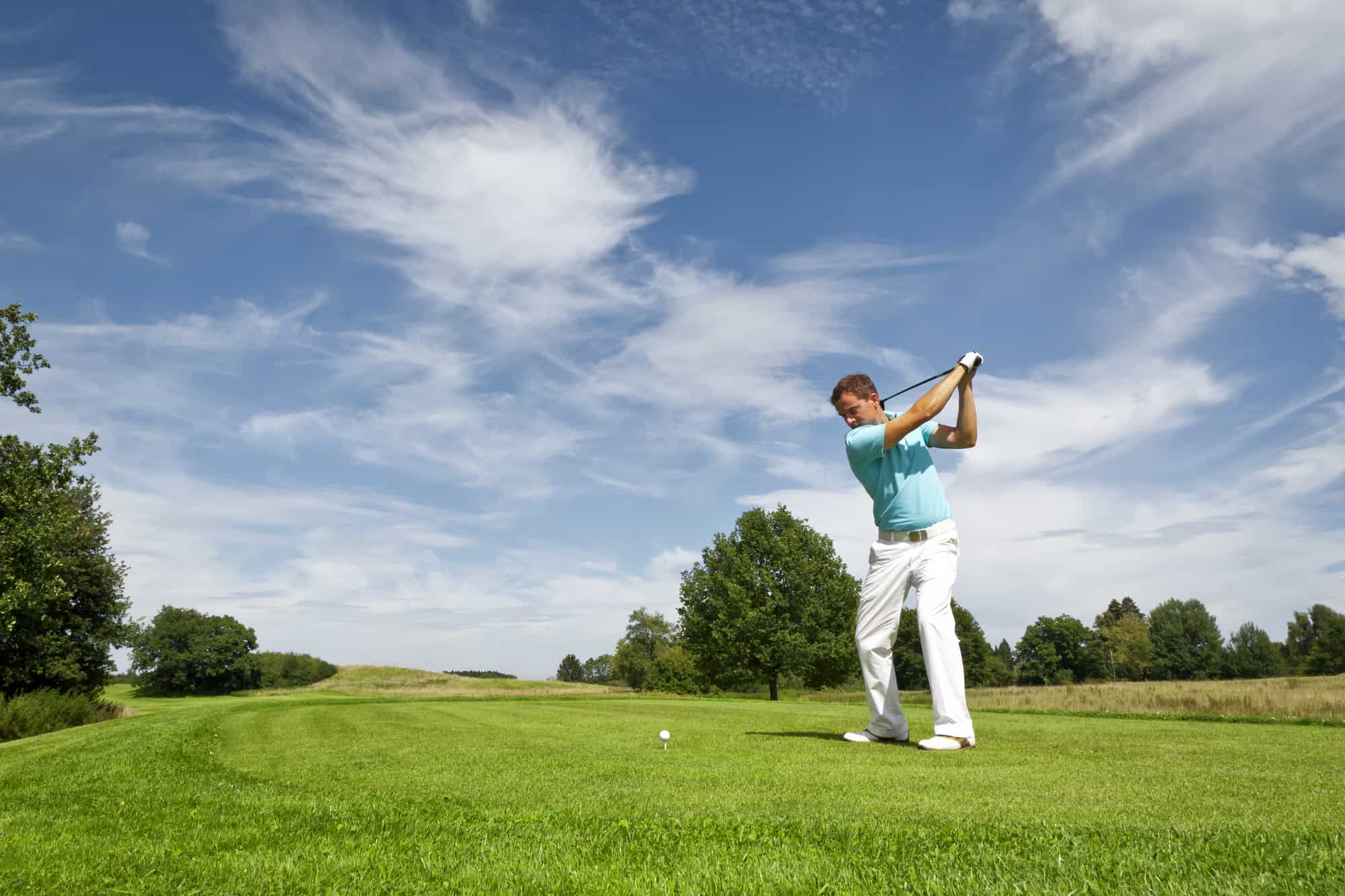 An image of a young male golf player