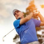 golfer shooting a golf ball