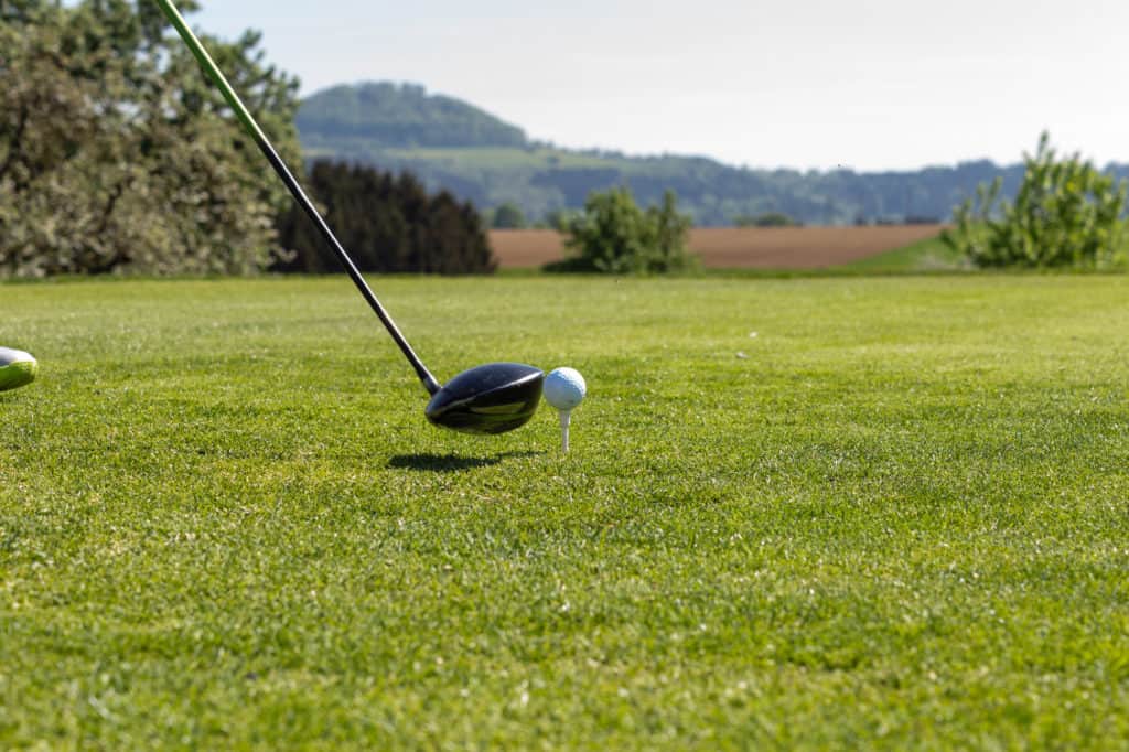 golf course lawn grass ball in springtime landscape of south germany countryside for relaxing outdoors