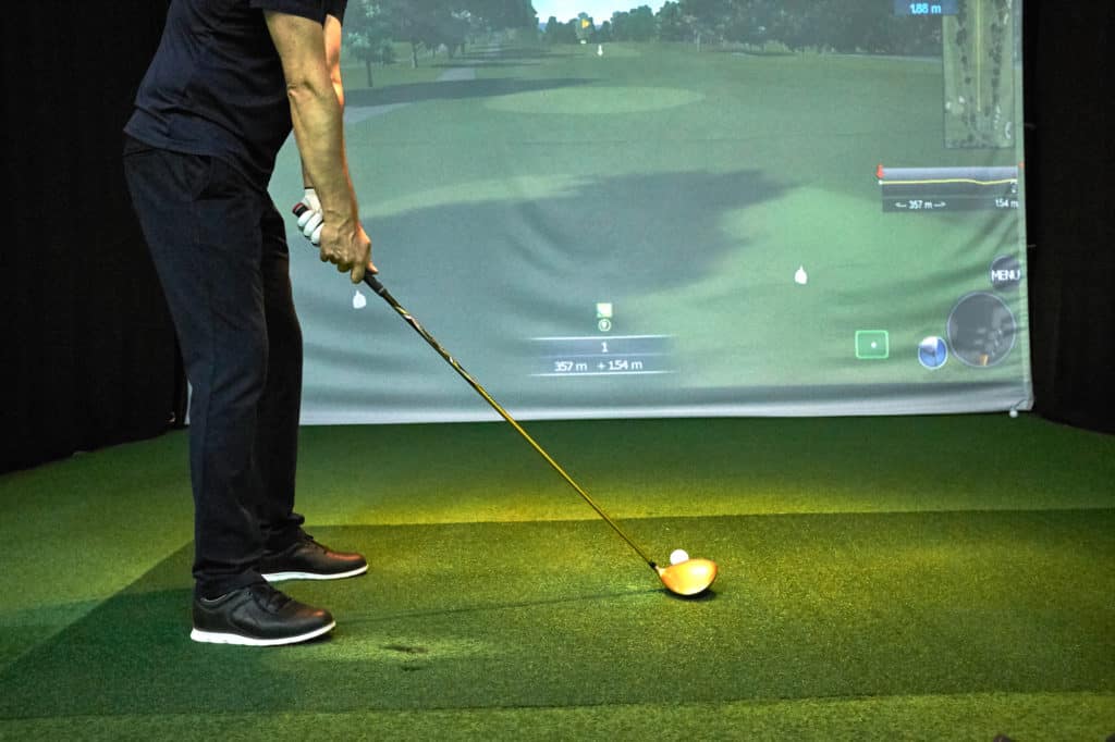 Playing golf on the simulator