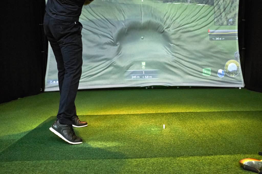 Playing golf on the simulator