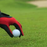 Close-up hand hold golf ball