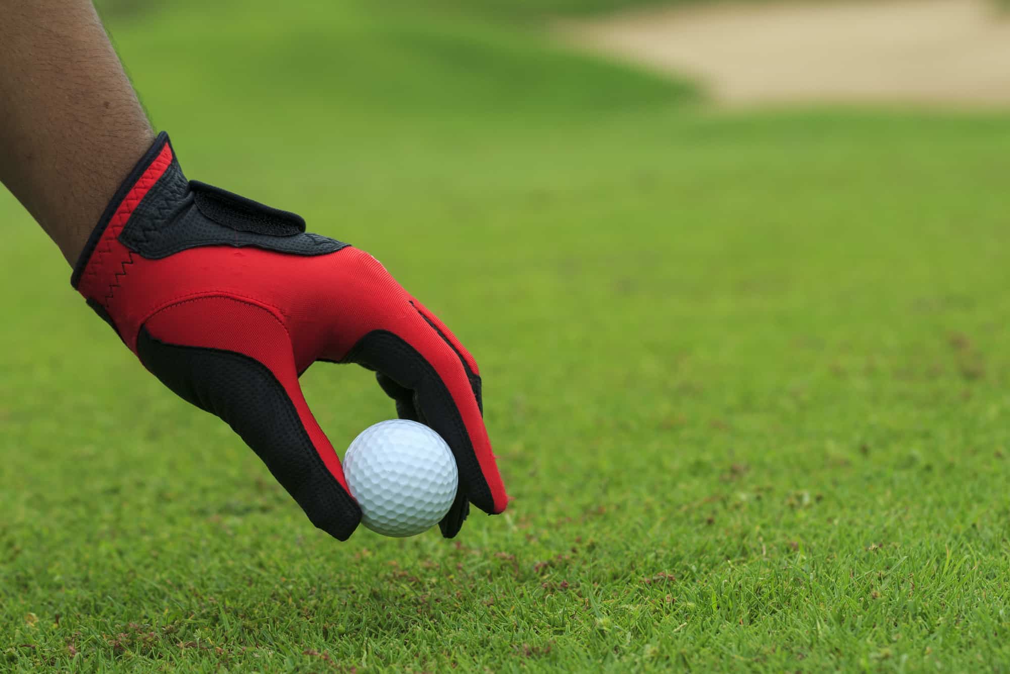 Close-up hand hold golf ball