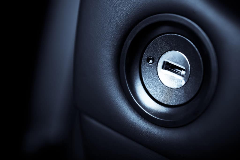 Close up shot of the ignition keyhole in a car