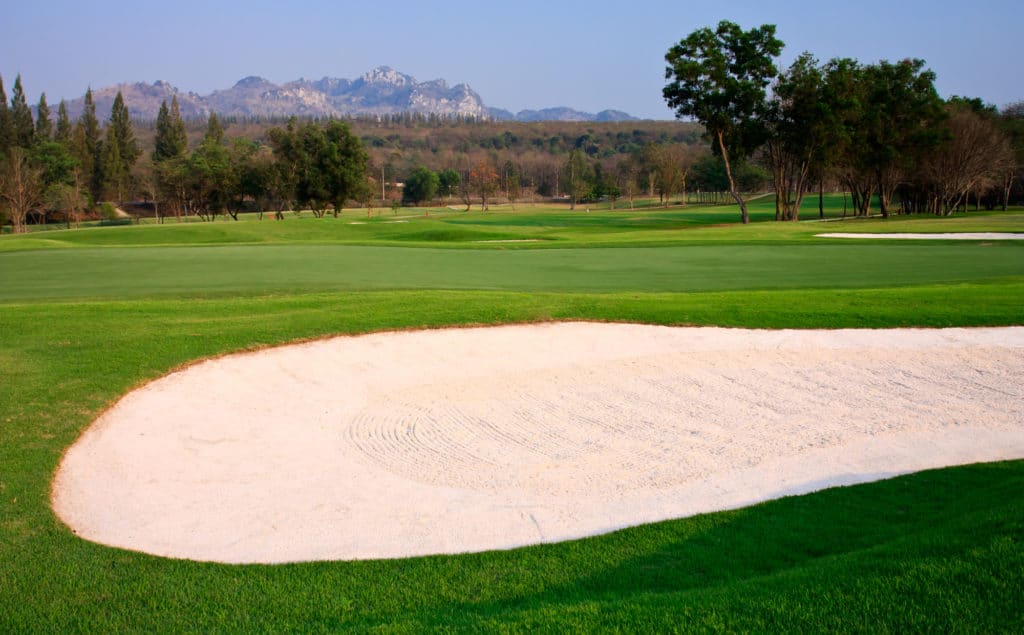 Golf course near mountain