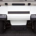 front of golf cart parked in the garage