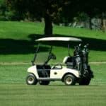 A Golf cart on the fairway of a course