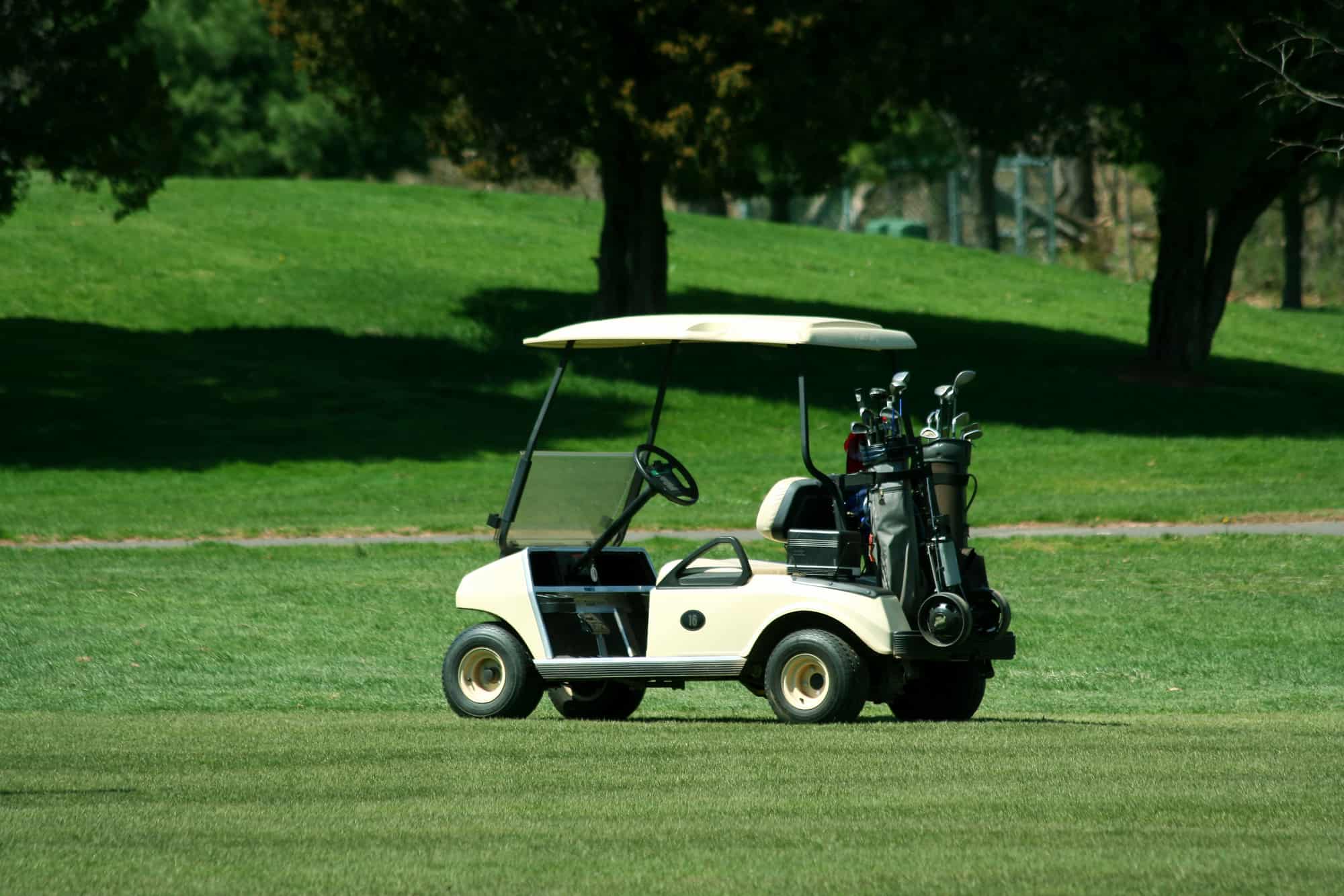 A Golf cart on the fairway of a course