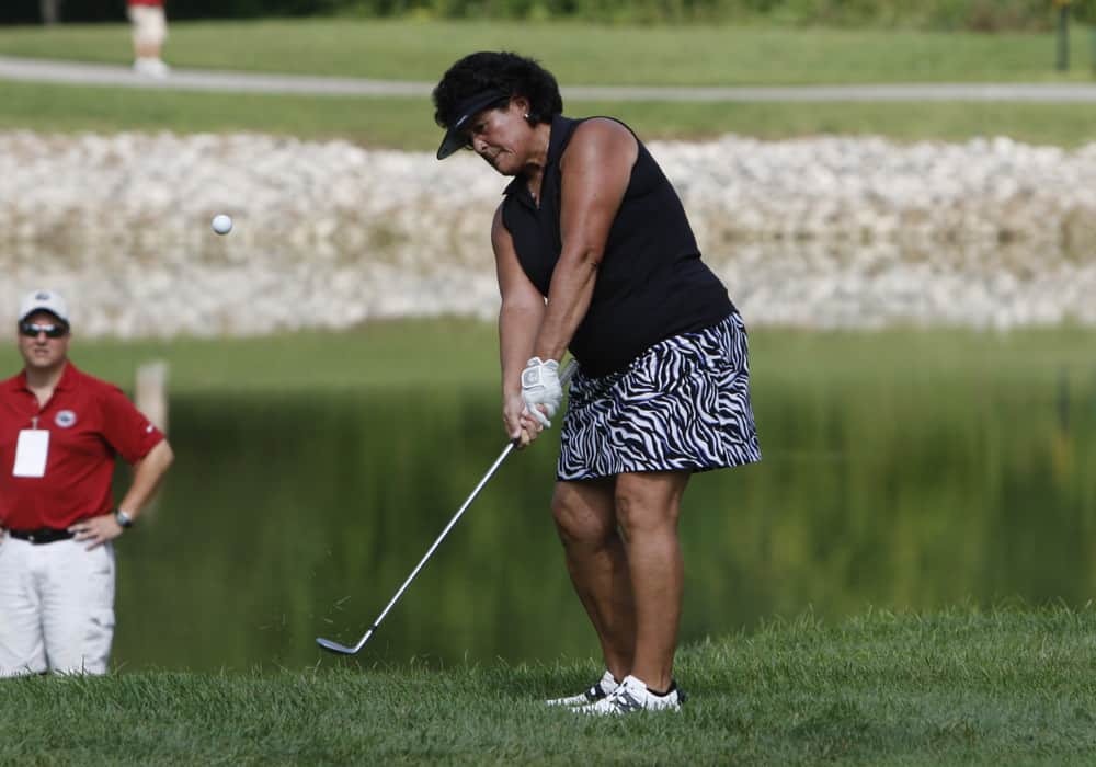 11 August 2013: Golfing great Nancy Lopez chips the ball during the 16th Fuzzy Zoeller's Wolf Challenge benefiting Fuzzy's Favorite Children's Charities at Covered Bridge Golf Club in Sellersburg, IN