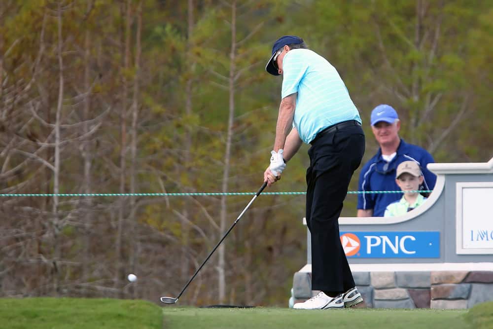 Ray Floyd tees off during the first round of the PNC Father-Son Challenge at The Ritz-Carlton Golf Club in Orlando, Florida.