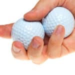 Golf balls in hand