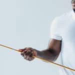 sportsman holding golf club