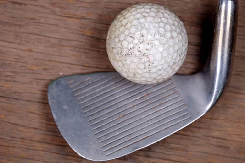 Antique golf club and ball