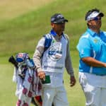 Golf Professional with caddie