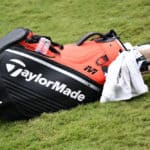 A TaylorMade branded golf bag lies along the fringe on the 15th green during the final round of the Wyndham Championship at Sedgefield Country Club on August 4, 2019 in Greensboro, NC.