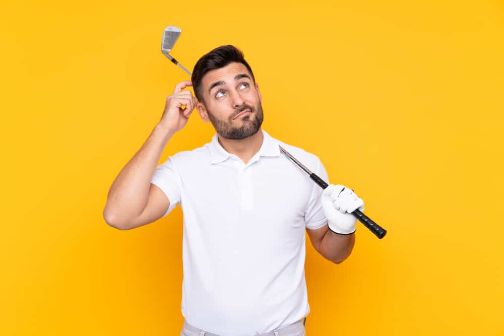 Golfer player thinking confused