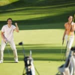 Golfers playing golf on golf course