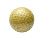 Old yellowed golf ball