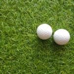 Two golf ball on grass