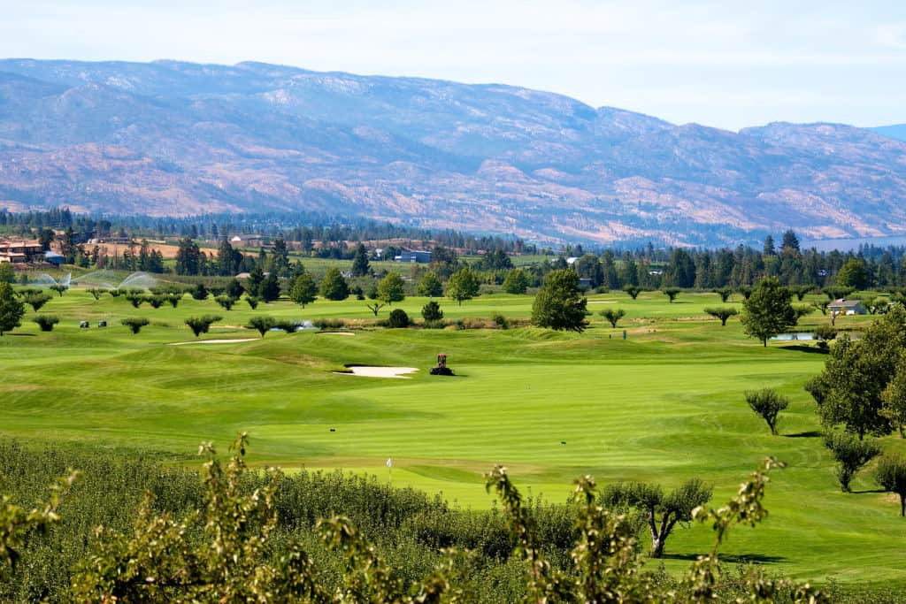 executive golf course with mountains 