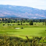 executive golf course with mountains
