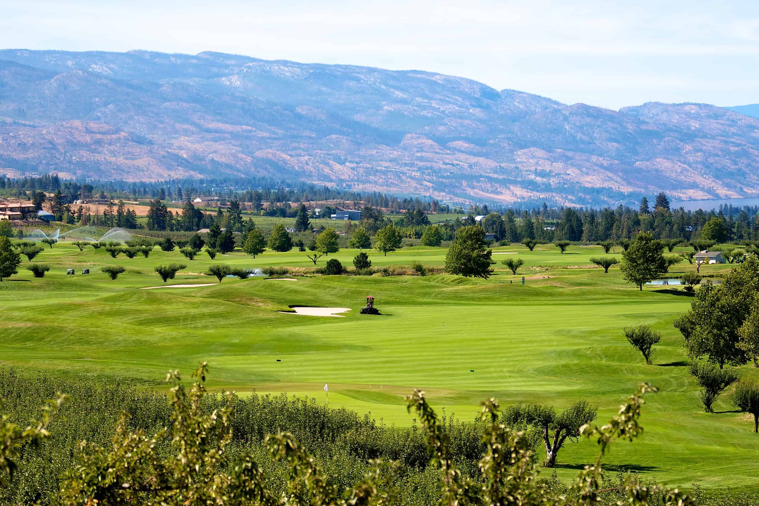 executive golf course with mountains