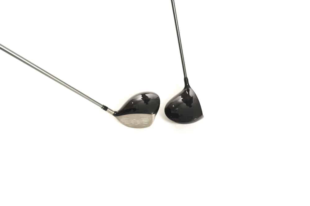 golf clubs over white