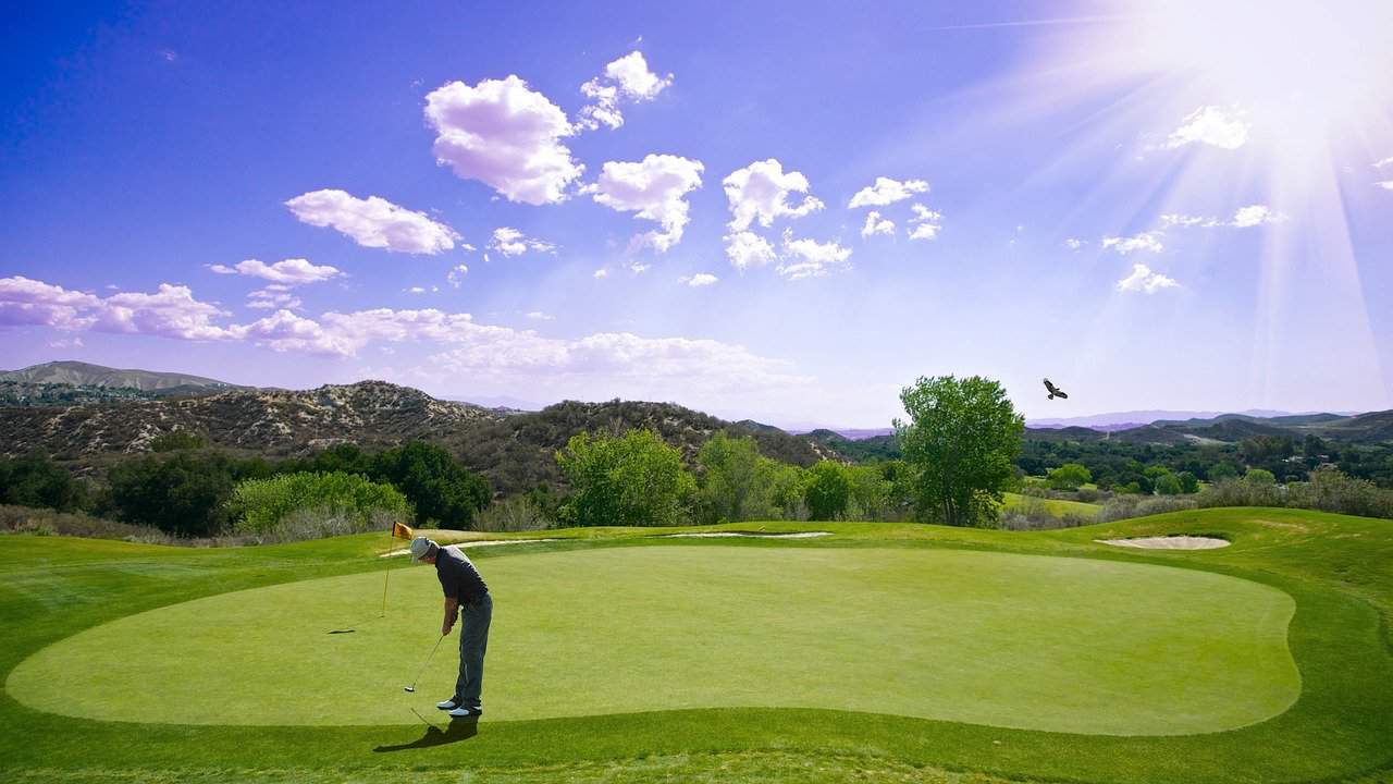 golfer near hole