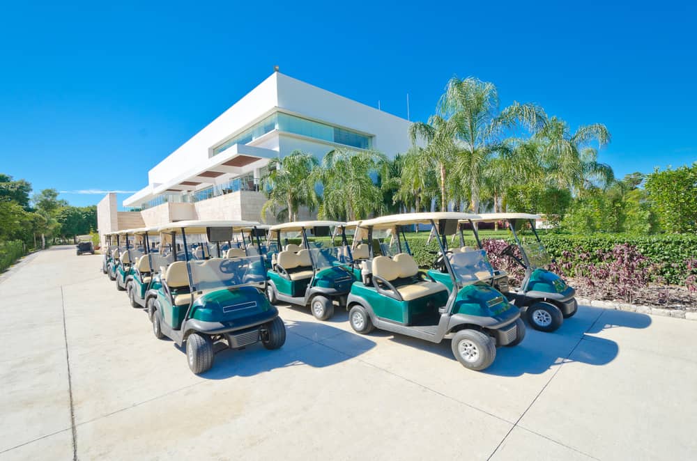 Golf carts at a golf course waiting for rent