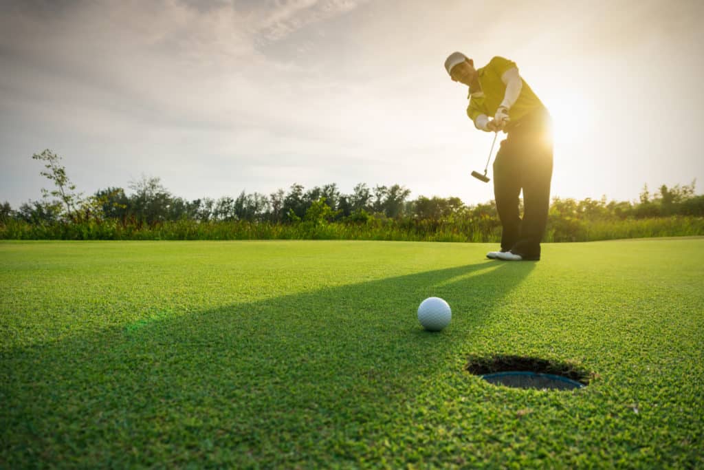 Golfer on green