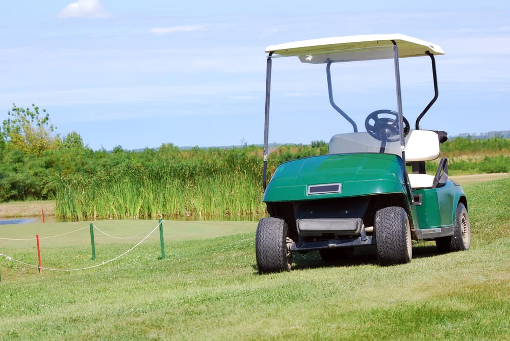 Golf,Buggy,On,Green,Grass,Field